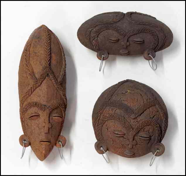 Appraisal: THREE AFRICAN CLAY HEADS Largest '' long Condition No Specific