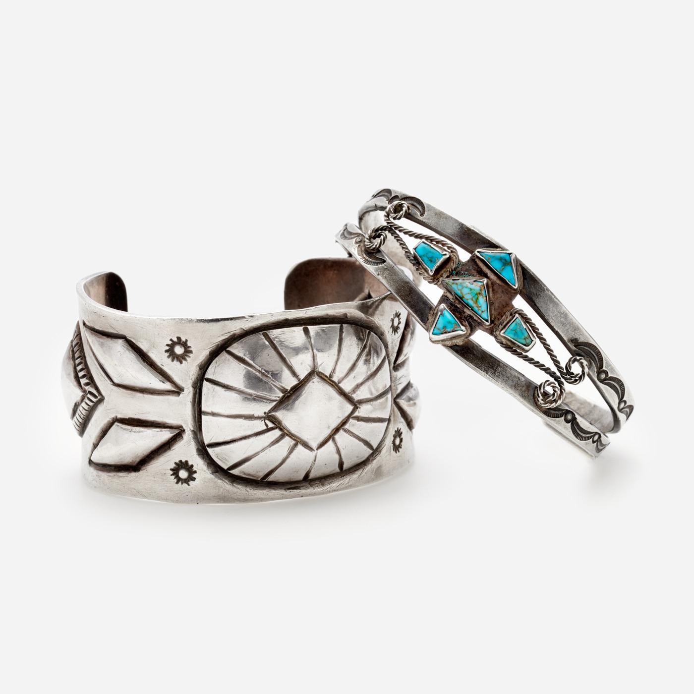 Appraisal: NAVAJO SILVER BRACELETS REPOUSSE CHISEL TURQUOISE Two Navajo silver bracelets