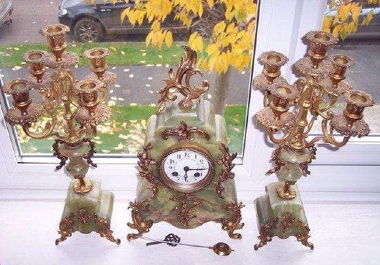 Appraisal: An onyx and gilt metal mounted clock the clock fitted