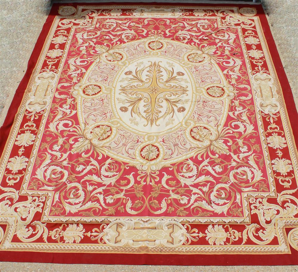 Appraisal: LARGE AUBUSSON STYLE RUG central design on cream field radiating