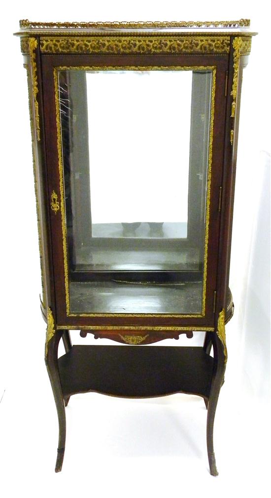 Appraisal: French curio cabinet fruitwood with metal mounts single door bowed