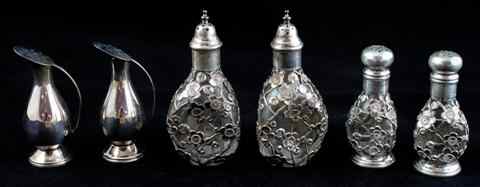 Appraisal: THREE JAPANESE SILVER SALT PEPPER SETS including a pair shaped