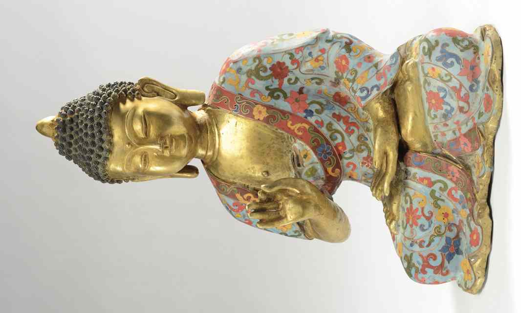 Appraisal: GILT METAL FIGURE OF A SEATED BUDDHA in classical pose