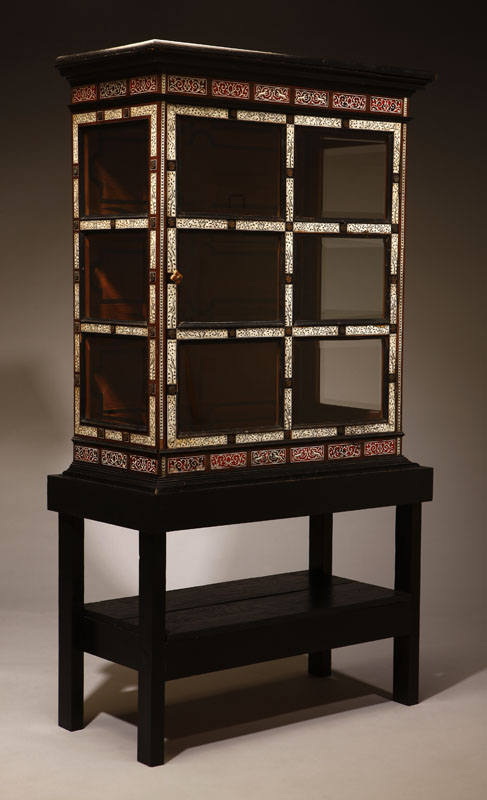 Appraisal: A Flemish Baroque style ivory and tortoiseshell-inlaid parcel-ebonized rosewood vitrine