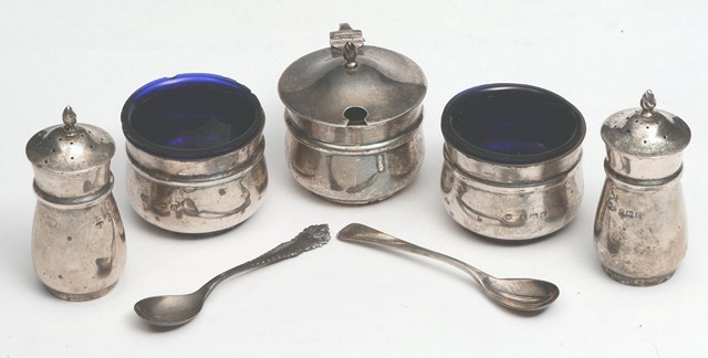 Appraisal: A SILVER CONDIMENT SET comprising two pepper pots two salt