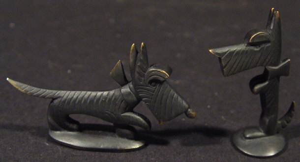 Appraisal: Two Hagenauer style bronze dogs impressed marks to the bases