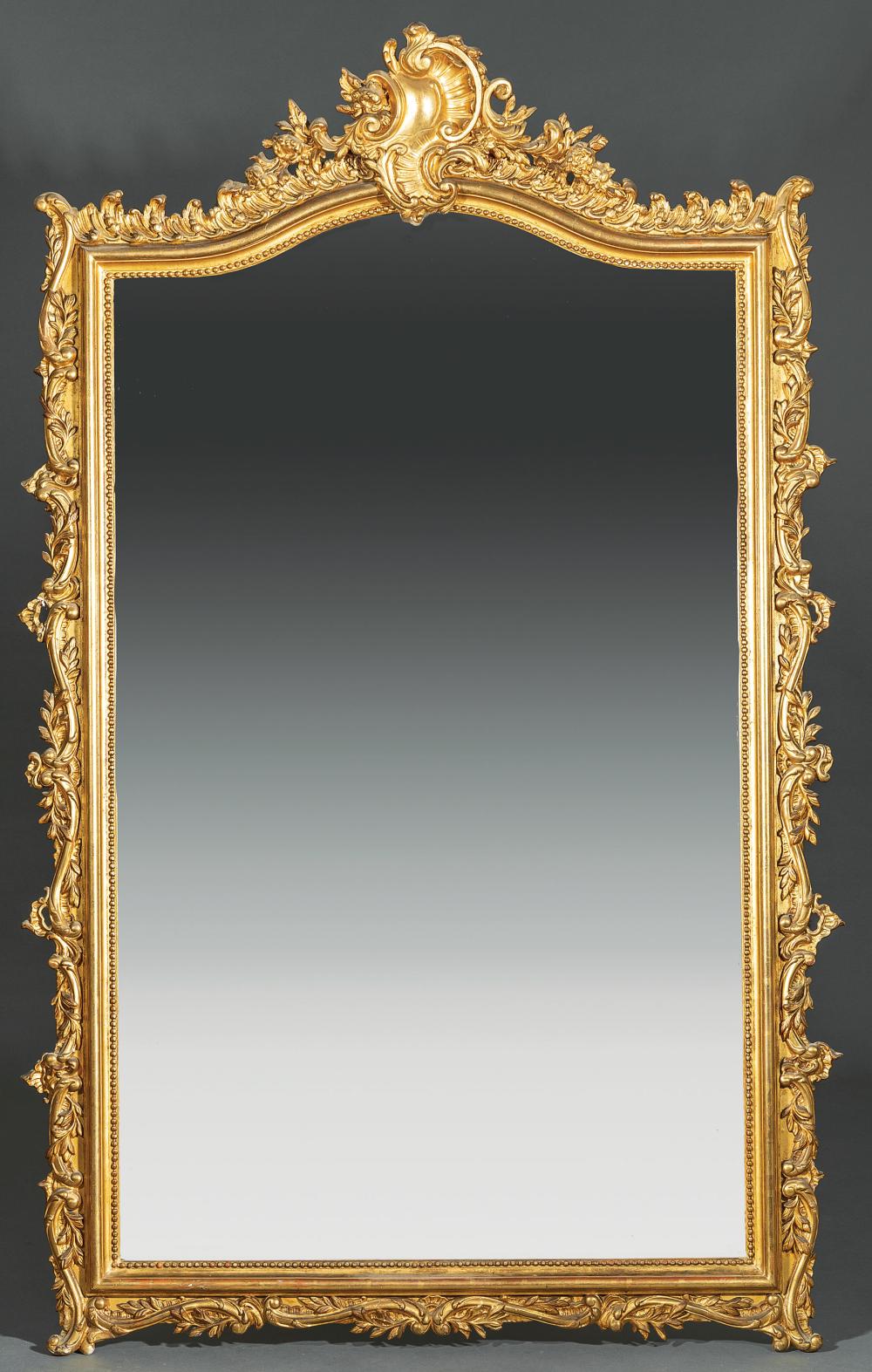 Appraisal: Fine Pair of American Rococo Carved and Gilded Mirrors mid-