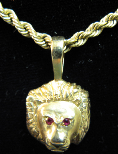 Appraisal: RUBY AND FOURTEEN KARAT GOLD PENDANT AND CHAIN NECKLACE The