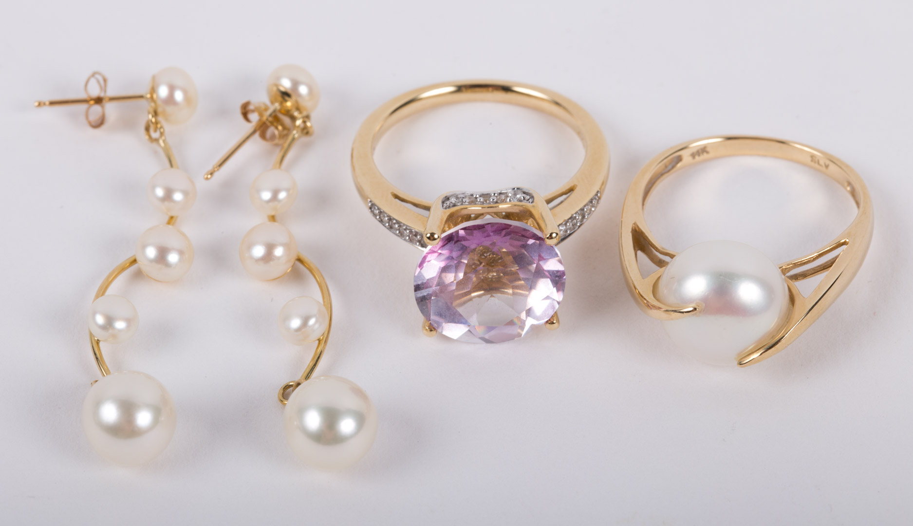 Appraisal: A Pearl Ring Earrings A Lilac Topaz Ring K lilac