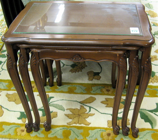 Appraisal: A NESTING SET OF THREE OCCASIONAL TABLES French Provincial style