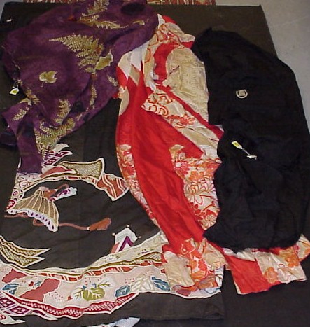 Appraisal: Group of four silk Japanese kimonos black with red lining