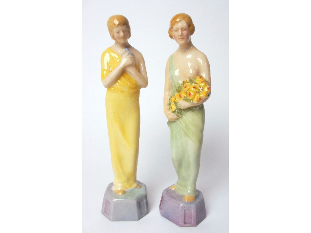 Appraisal: Two Royal Doulton figures of 'Spring' and 'Summer' one holding