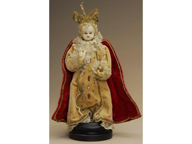 Appraisal: Wax Infant of Prague on Pedestal Base Continental mid th