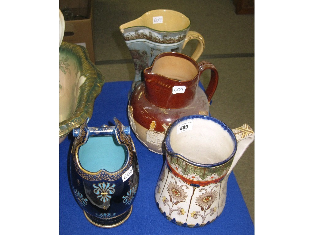 Appraisal: Three Royal Doulton jugs to include Dr Johnston at Temple