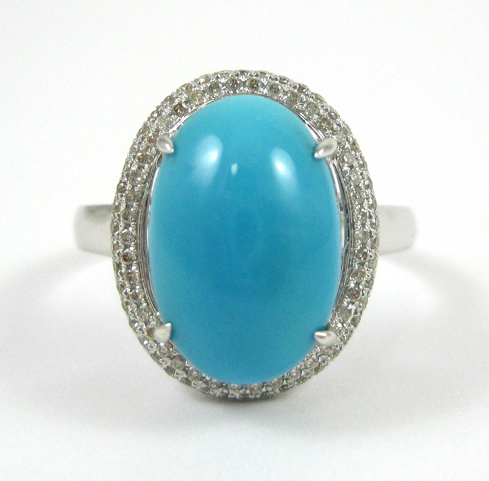 Appraisal: TURQUOISE DIAMOND AND FOURTEEN KARAT GOLD RING The white gold