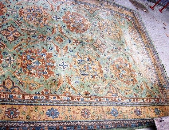 Appraisal: A Mirzapur carpet of pale green ground and central green