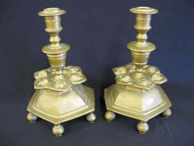 Appraisal: Pair of Early Brass Candlesticks footed cherub faces '' tall