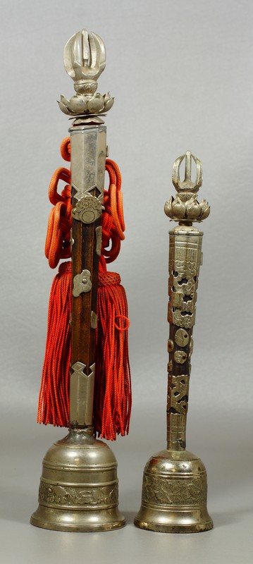 Appraisal: Tibetan wood white metal bells long handled bells of similar