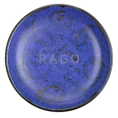 Appraisal: ANTONIO PRIETO Glazed stoneware low bowl with swirls on purple