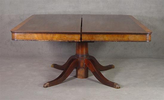 Appraisal: Mahogany Expanding Dining Table th Century Classical saber legs with