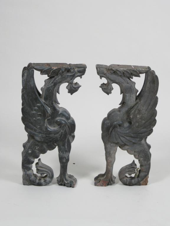 Appraisal: A pair of carved wooden Gryphons in H