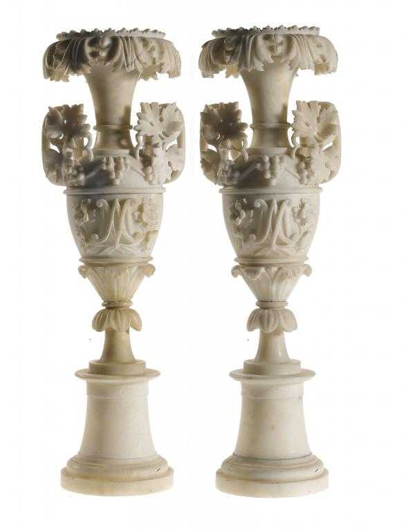 Appraisal: A PAIR OF VICTORIAN ALABASTER VASES of slender two handled