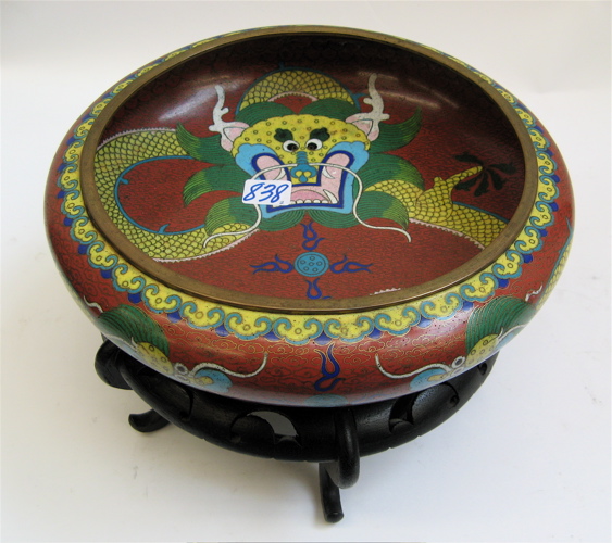 Appraisal: CHINESE PORCELAIN CHARGER AND A CLOISONNE BOWL The charger in