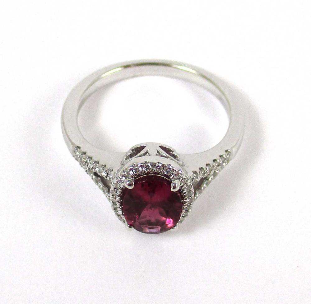 Appraisal: PINK TOURMALINE DIAMOND AND FOURTEEN KARAT GOLD RING The k