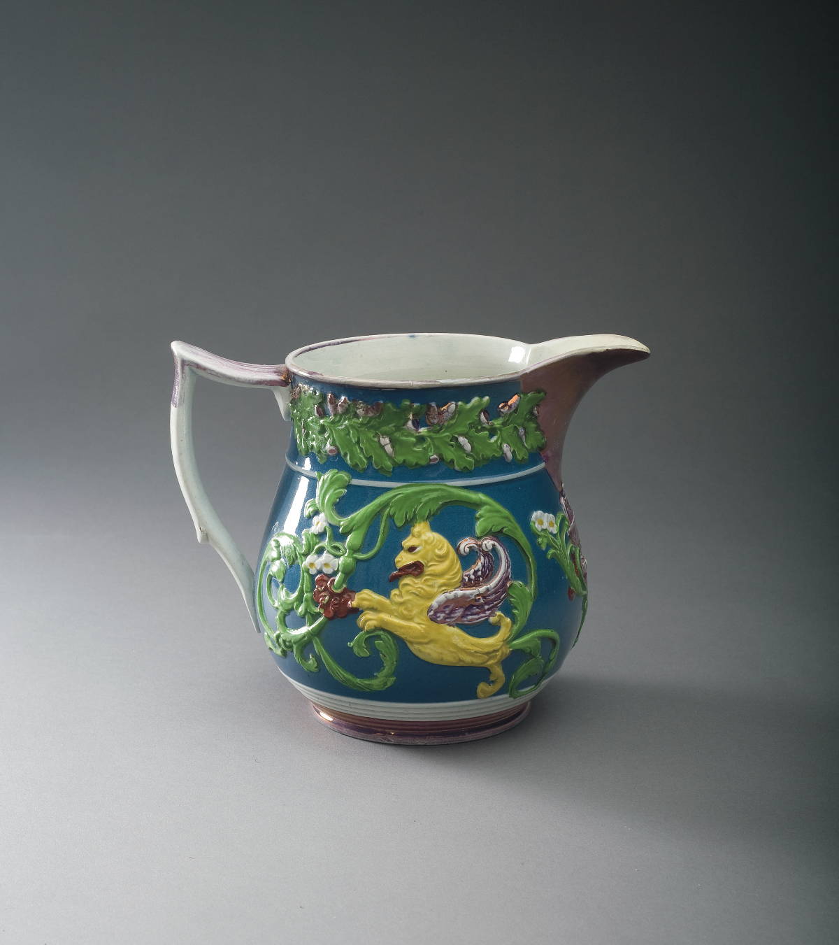 Appraisal: STAFFORDSHIRE PEARLWARE PINK LUSTRE AND ENAMEL-DECORATED BLUE-GROUND JUG ATTRIBUTED TO