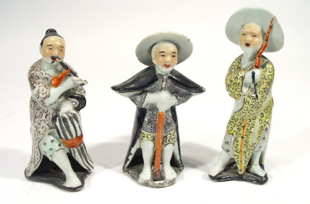 Appraisal: Three hand painted chinese poreclain figures playing musical instruments cm