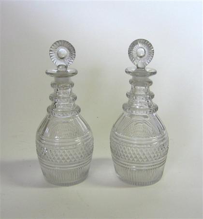 Appraisal: Pair of blown and cut decanters early th century Each