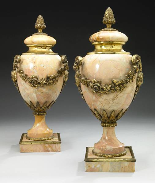 Appraisal: A pair of French bronze mounted marble urns second quarter