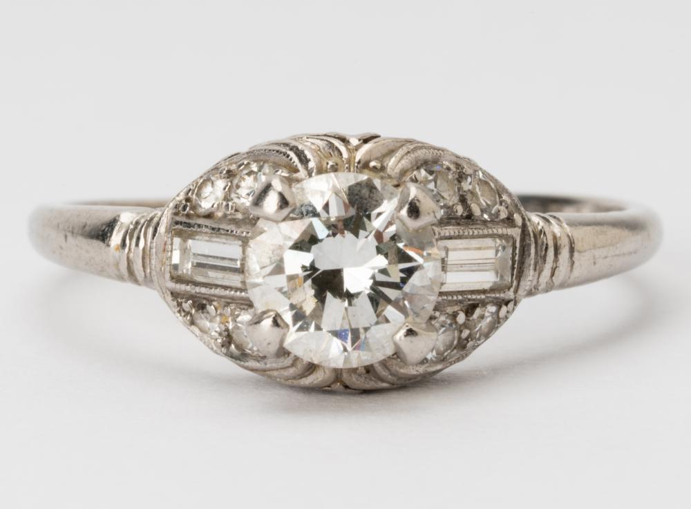 Appraisal: SHREVE CO PLATINUM DIAMOND RINGCenter prong set with one transitional