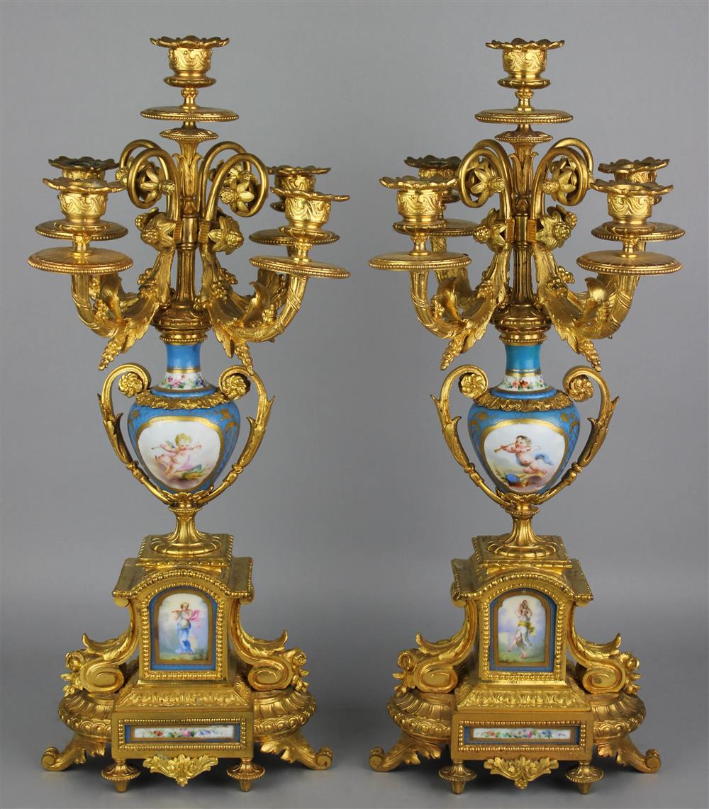 Appraisal: PAIR OF REGENCE STYLE GILT BRONZE AND PORCELAIN FIVE LIGHT