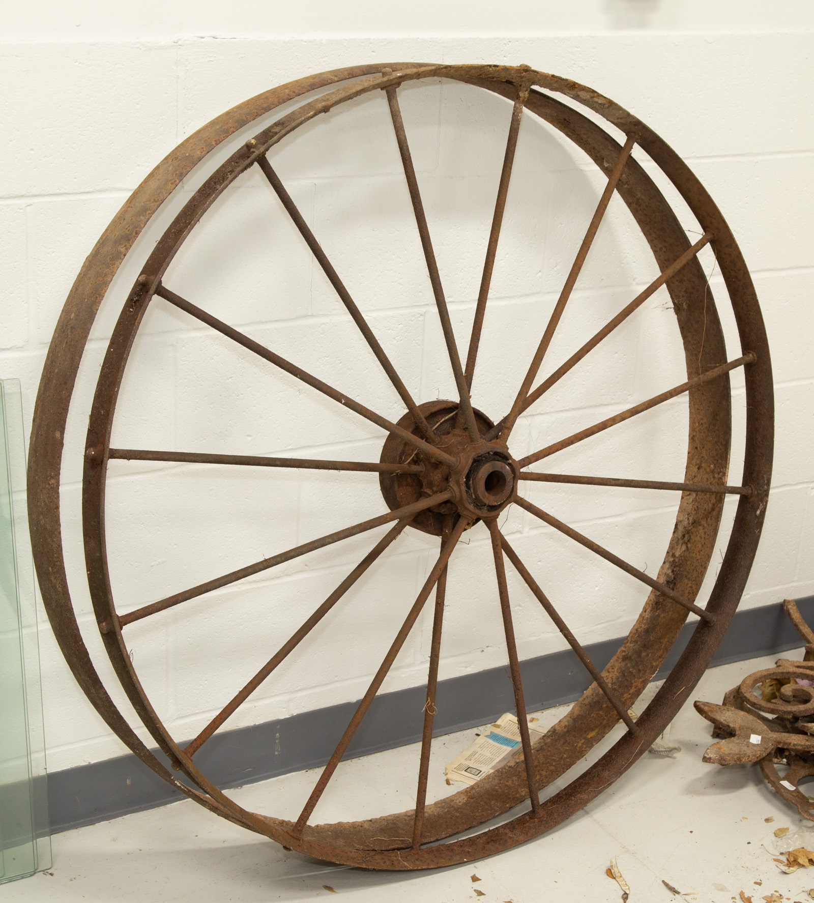 Appraisal: LARGE IRON CARRIAGE WHEEL AND IRON TIRE Late th century