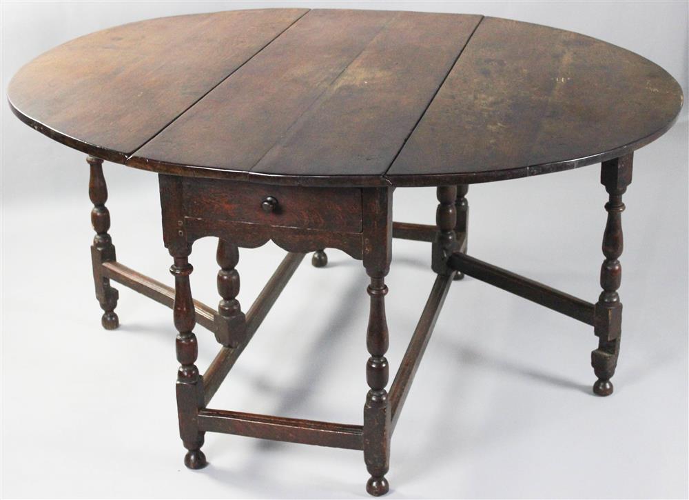 Appraisal: ENGLISH OAK GATELEG TABLE the rectangular top with D-shaped drop