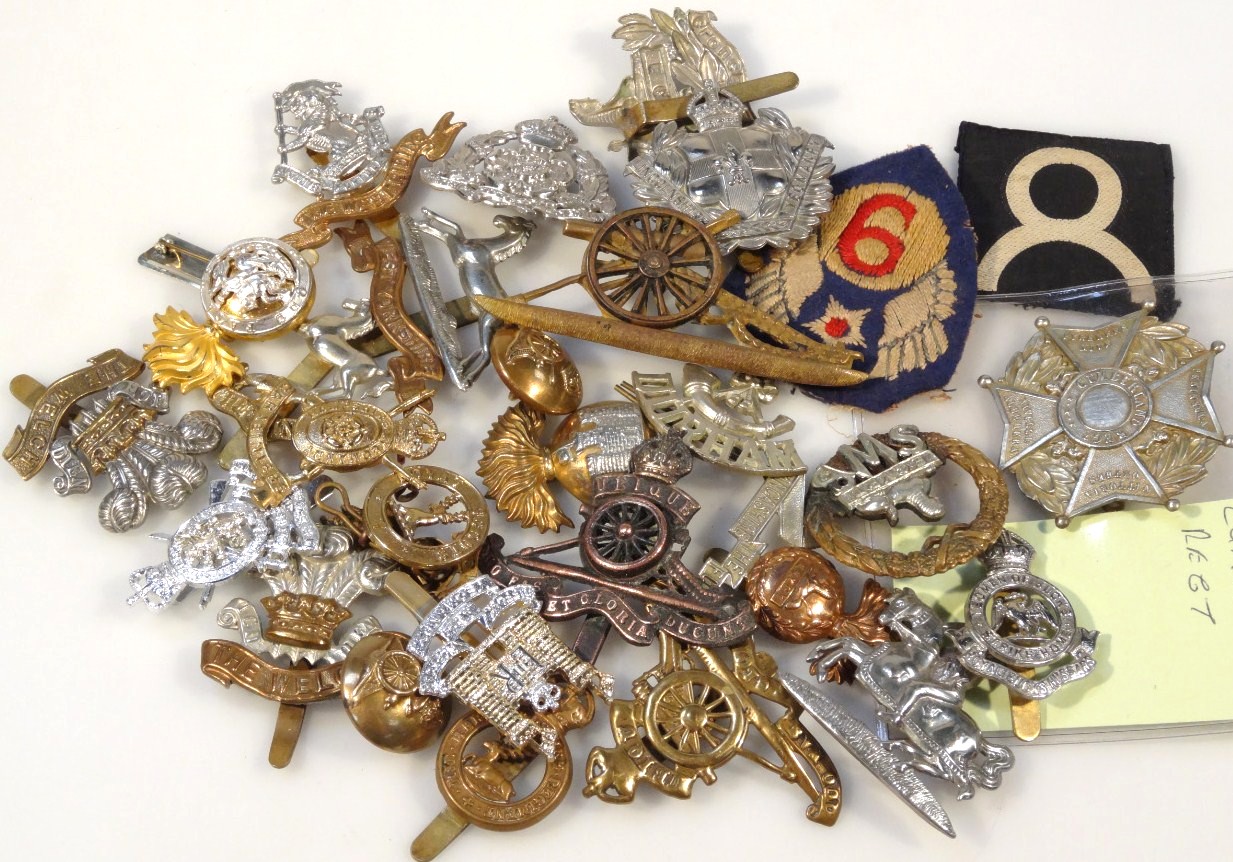 Appraisal: Various thC army cap badges to include Cumberland Regiment cm