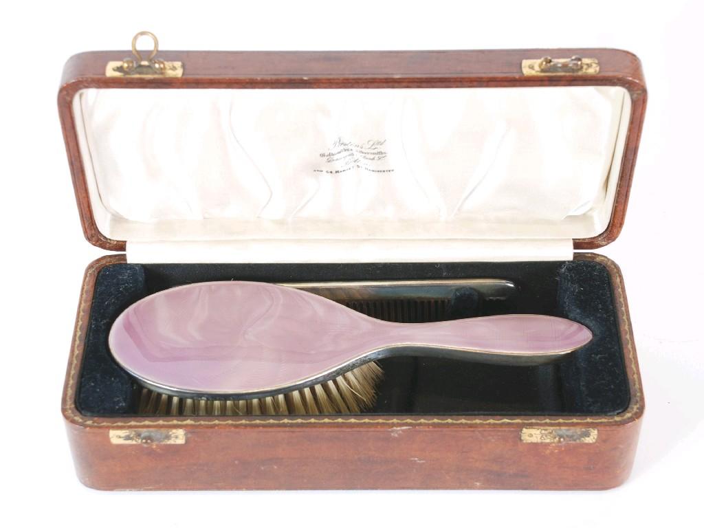 Appraisal: GEORGE V CASED SILVER AND GUILLOCHE ENAMELLED LADY'S HAIR BRUSH