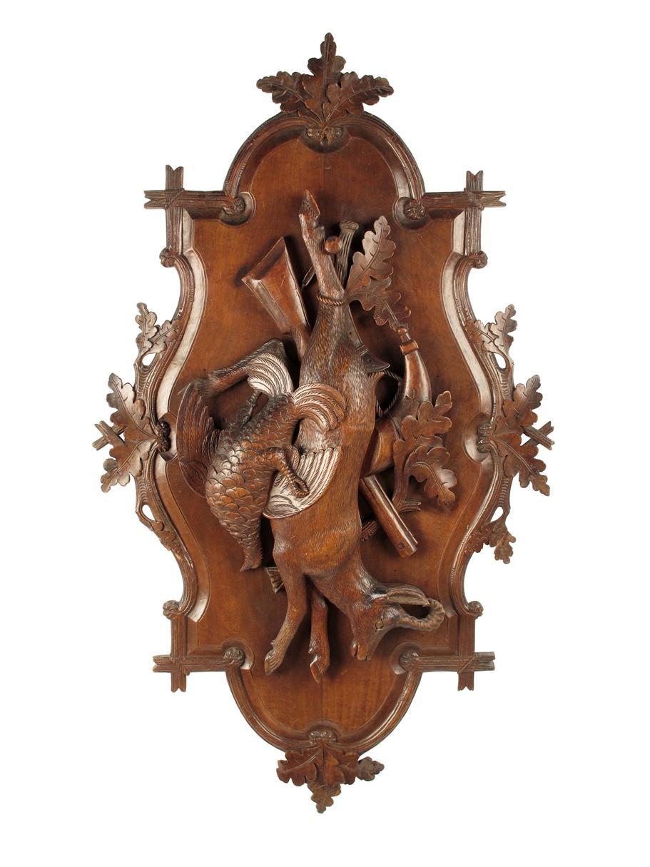 Appraisal: A Black Forest hunting trophy wall plaque