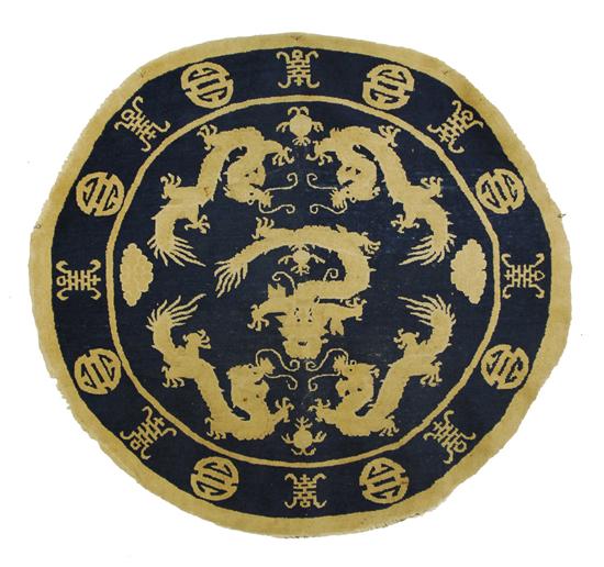 Appraisal: CHINESE ROUND DRAGON RUG late th century diameter feet Provenance