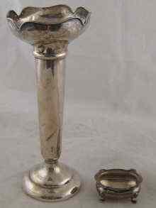 Appraisal: A tall silver vase loaded ht cm and a silver