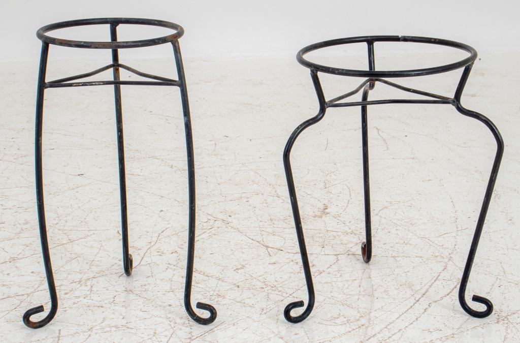 Appraisal: CAST IRON PLANT STAND PAIR Associated pair of cast iron