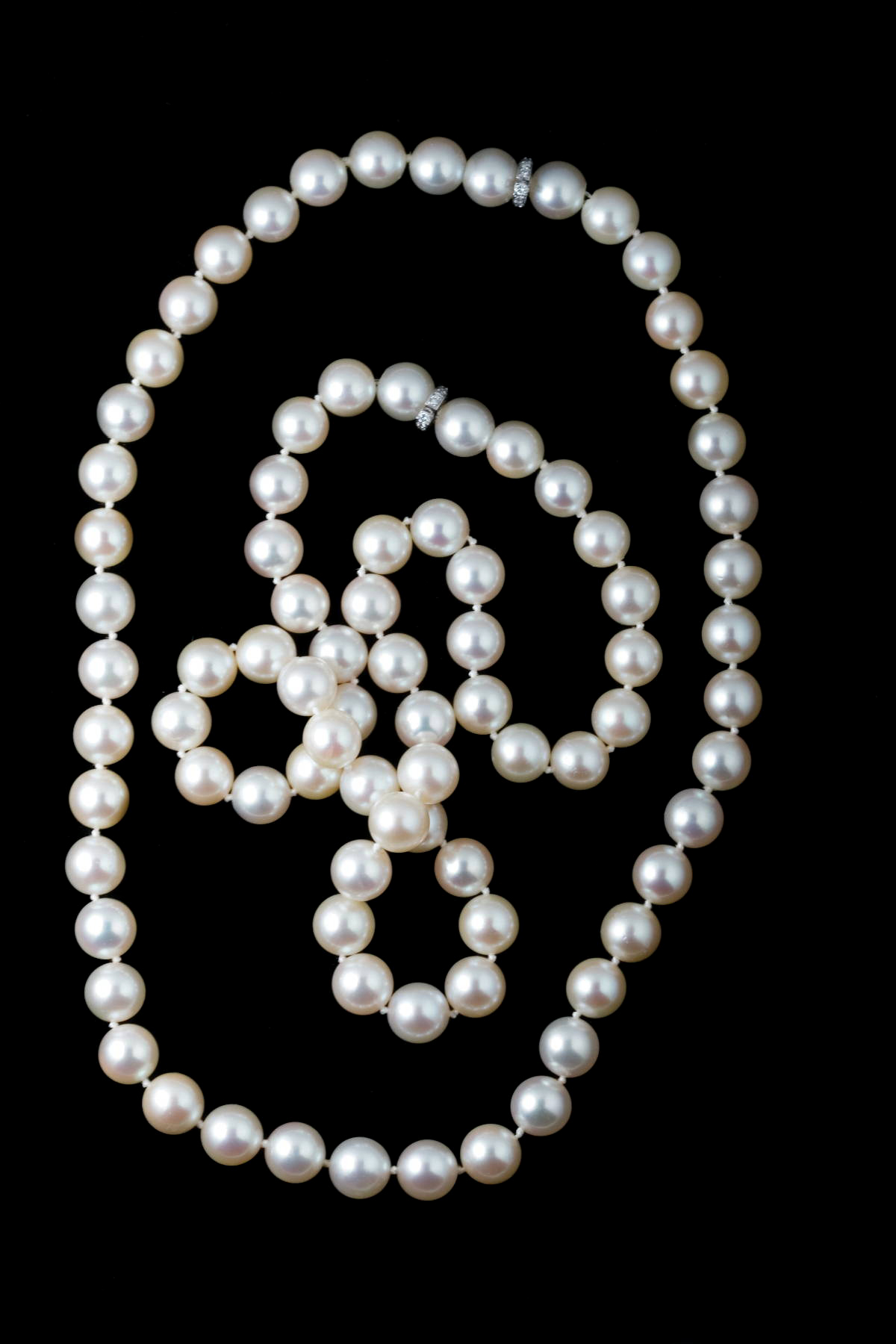 Appraisal: TWO STRANDS OF FINE ROSE PEARLS The strands with matched