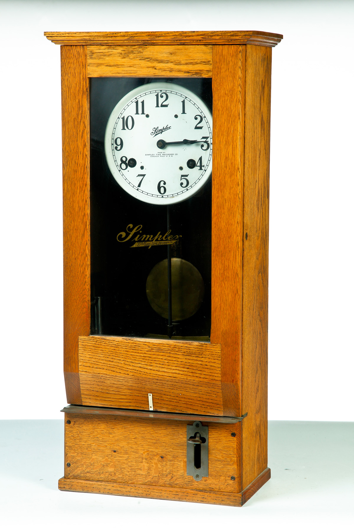 Appraisal: SIMPLEX TIME CLOCK American st half- th century oak Reverse