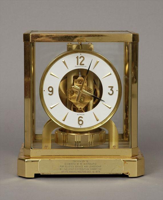 Appraisal: Le Coultre Swiss Brass and Glass 'Atmos' Clock Plaque bears