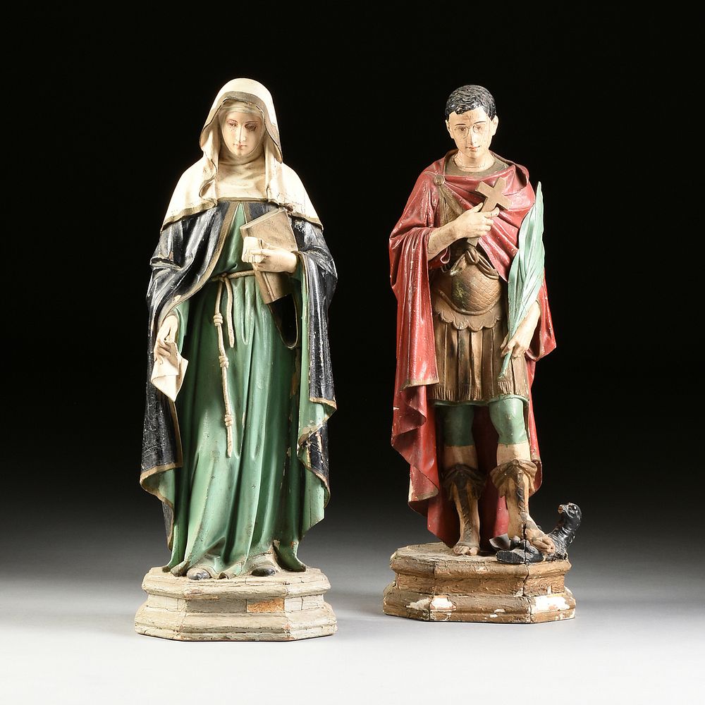 Appraisal: A PAIR OF ECCLESIASTICAL PAINTED WOOD SANTO FIGURES EARLY MID