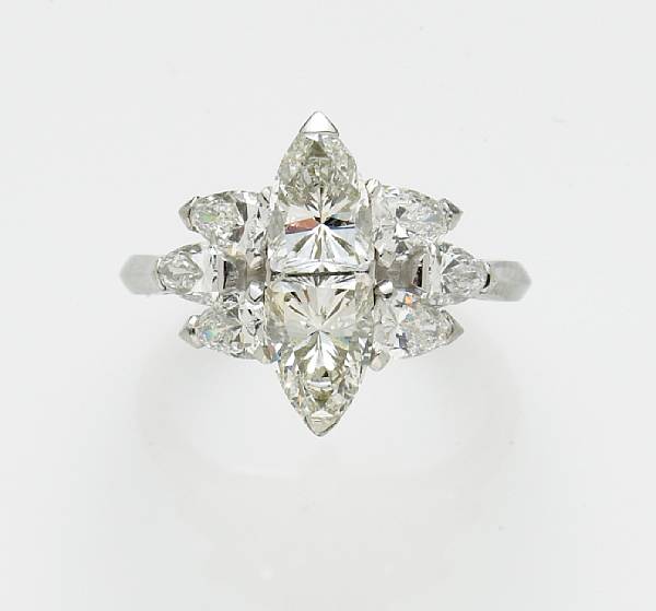 Appraisal: A diamond ring in a butterfly motif estimated total diamond