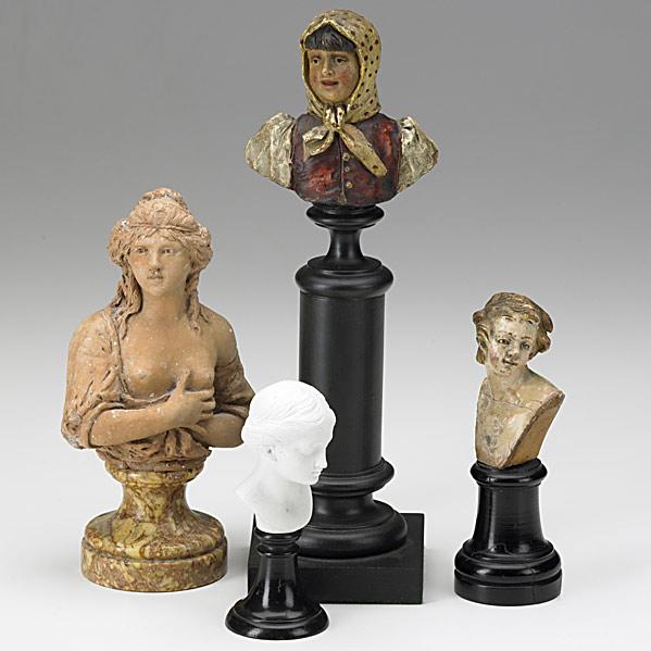 Appraisal: FOUR BUSTSTerra cotta and parian of womenEarly composition figurePolychromed woman