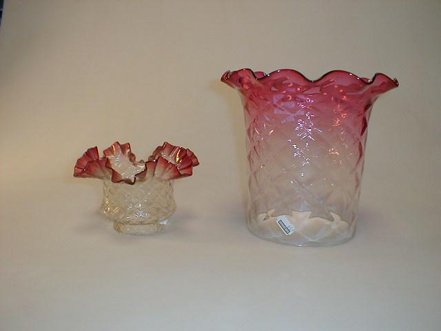 Appraisal: Two dimpled cranberry two clear glass shades