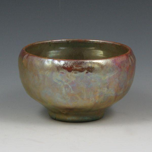 Appraisal: Pewabic bowl with iridescent green finish over purple and orange